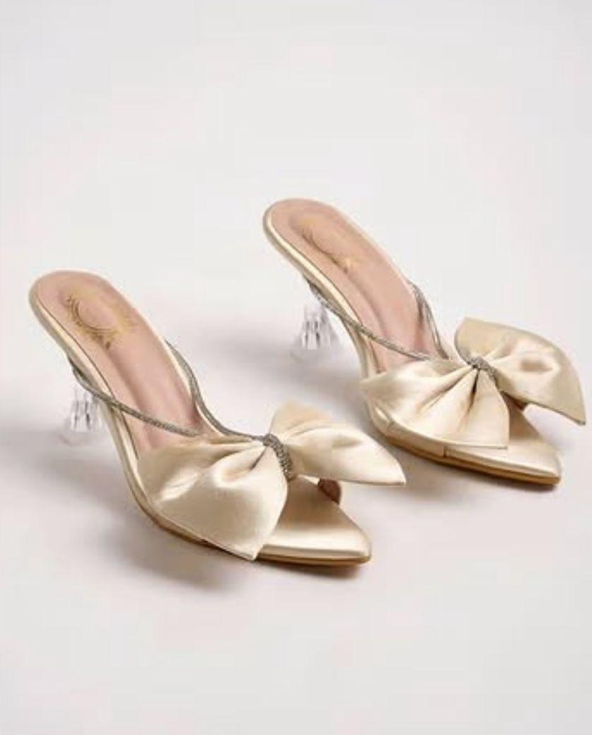 Champagne satin bow mules with clear heel